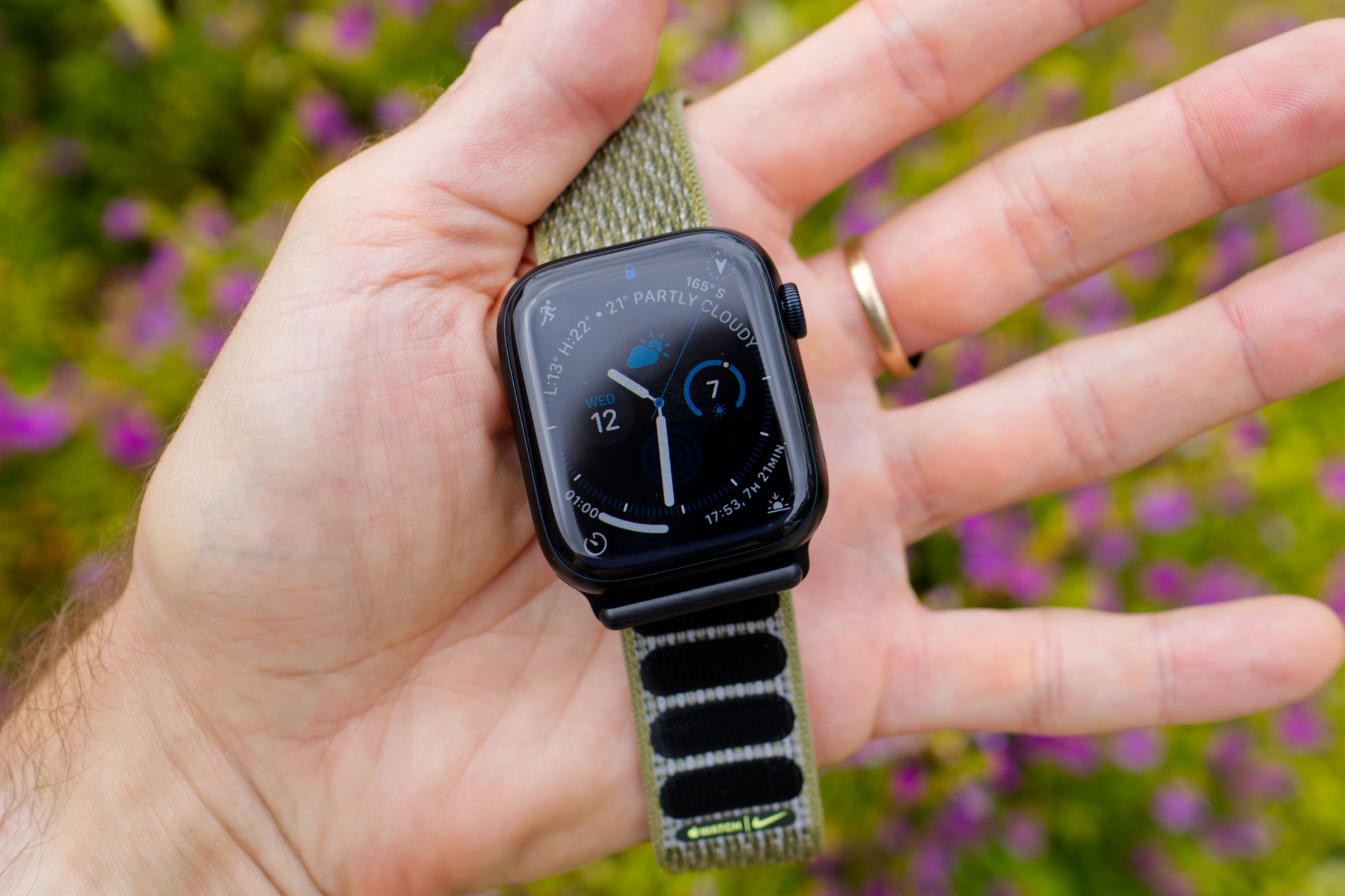 Apple Watch Series 8 in a person's hand.