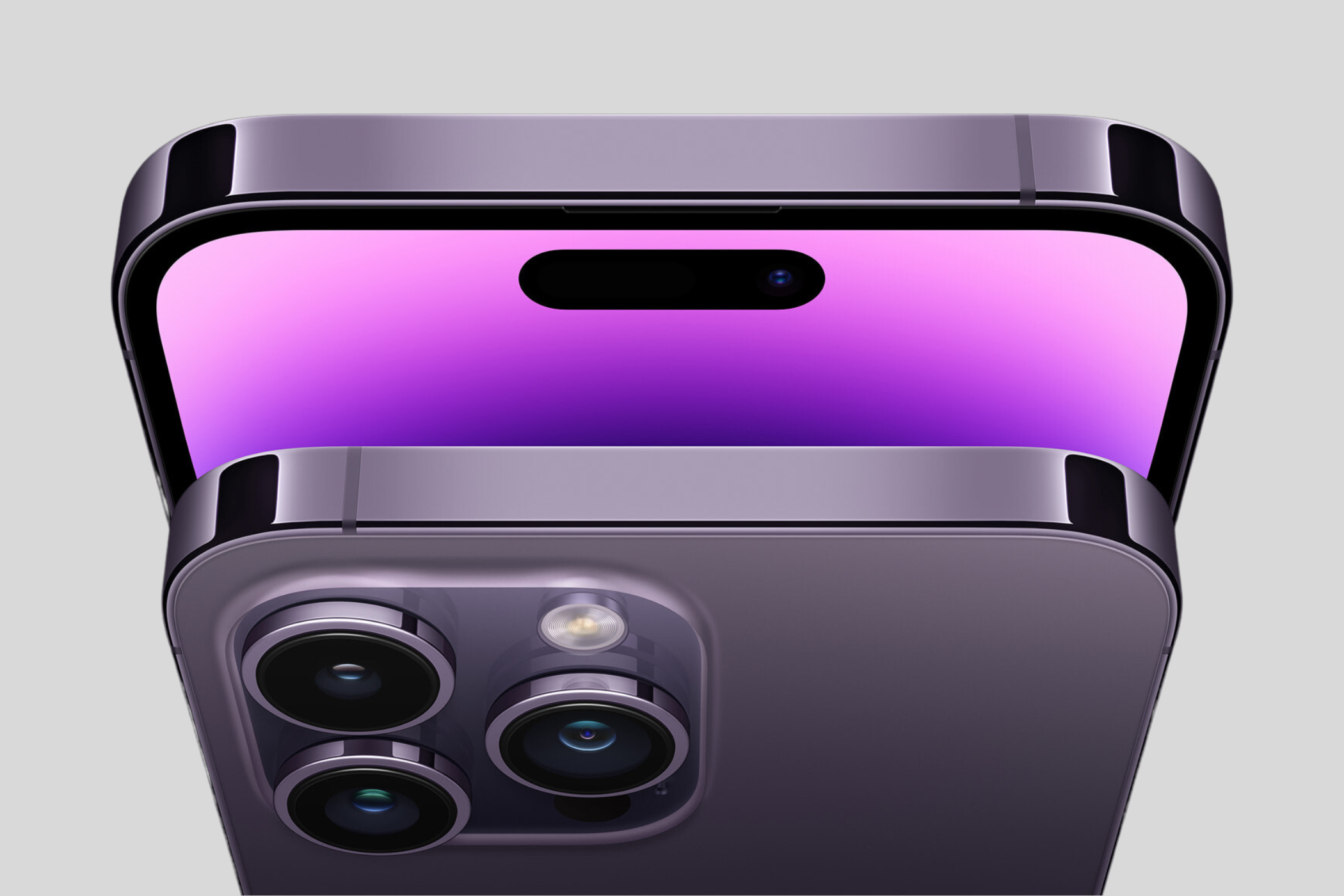 Image of the Dynamic Island on the iPhone 14 Pro along with its triple-rear facing camera.