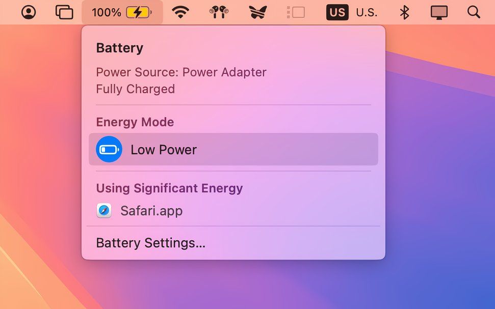 macOS menu bar with the Battery menu displaying the Low Power option as enabled.