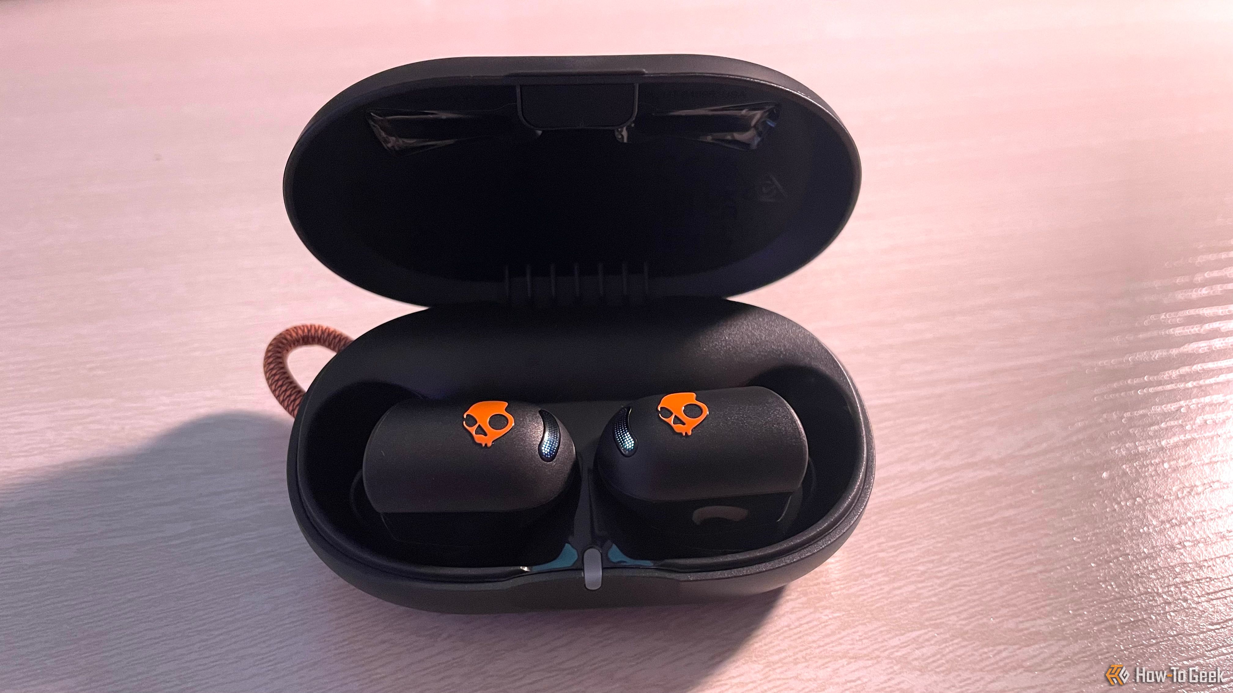 The Skullcandy Sesh ANC Active earbuds in the charging case