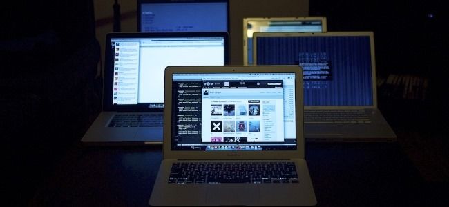 Laptops having different screen sizes placed on a table.