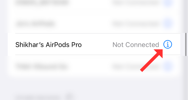 Connected AirPods name in the Bluetooth menu with an arrow next to the information button.