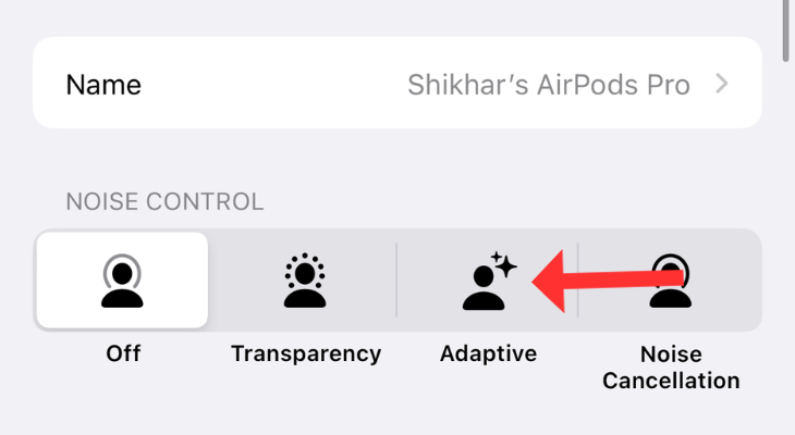 AirPods settings menu with an arrow next to Adaptive Audio.