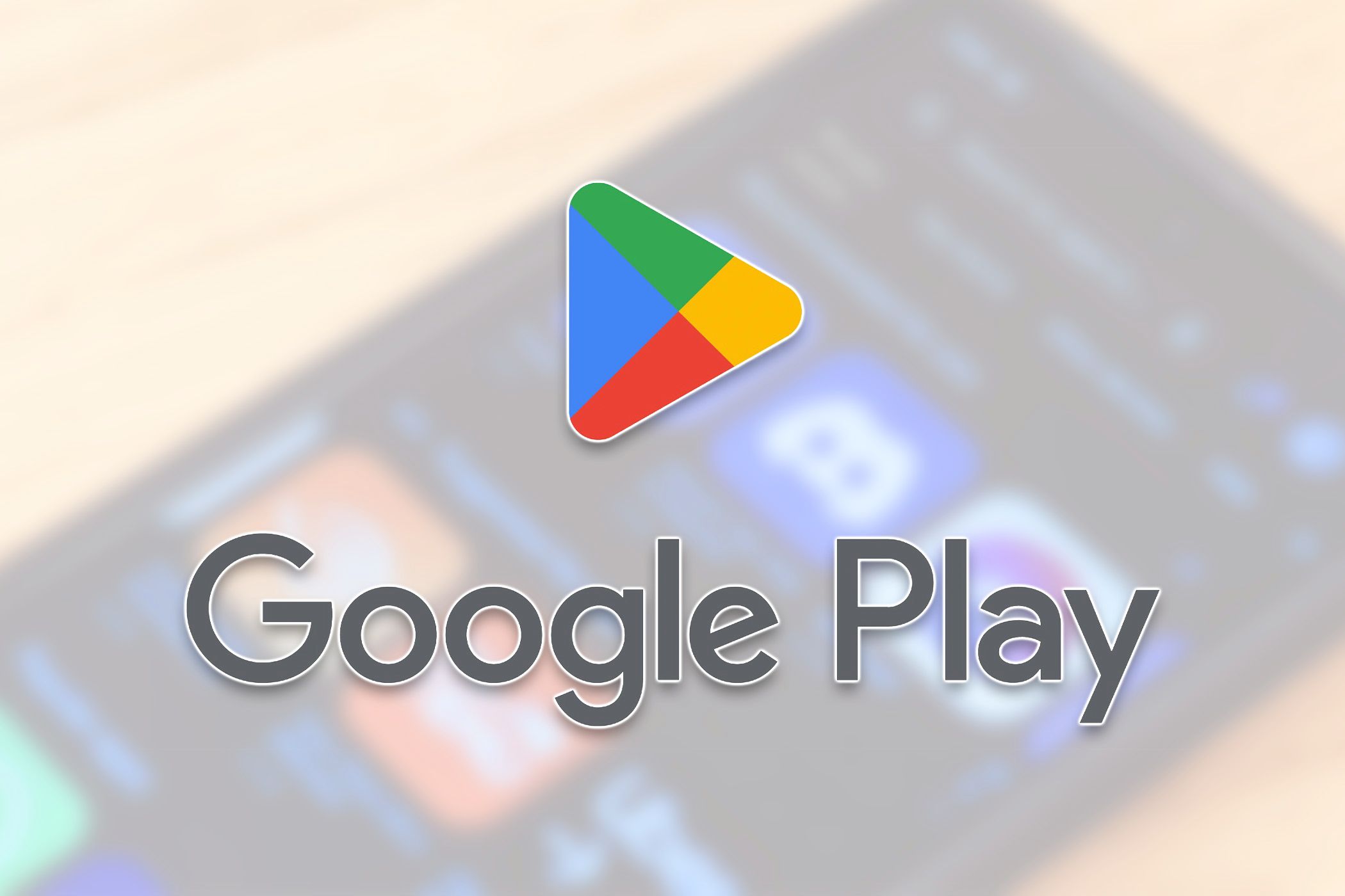 The Google Play Store logo over a photo of an Android phone.