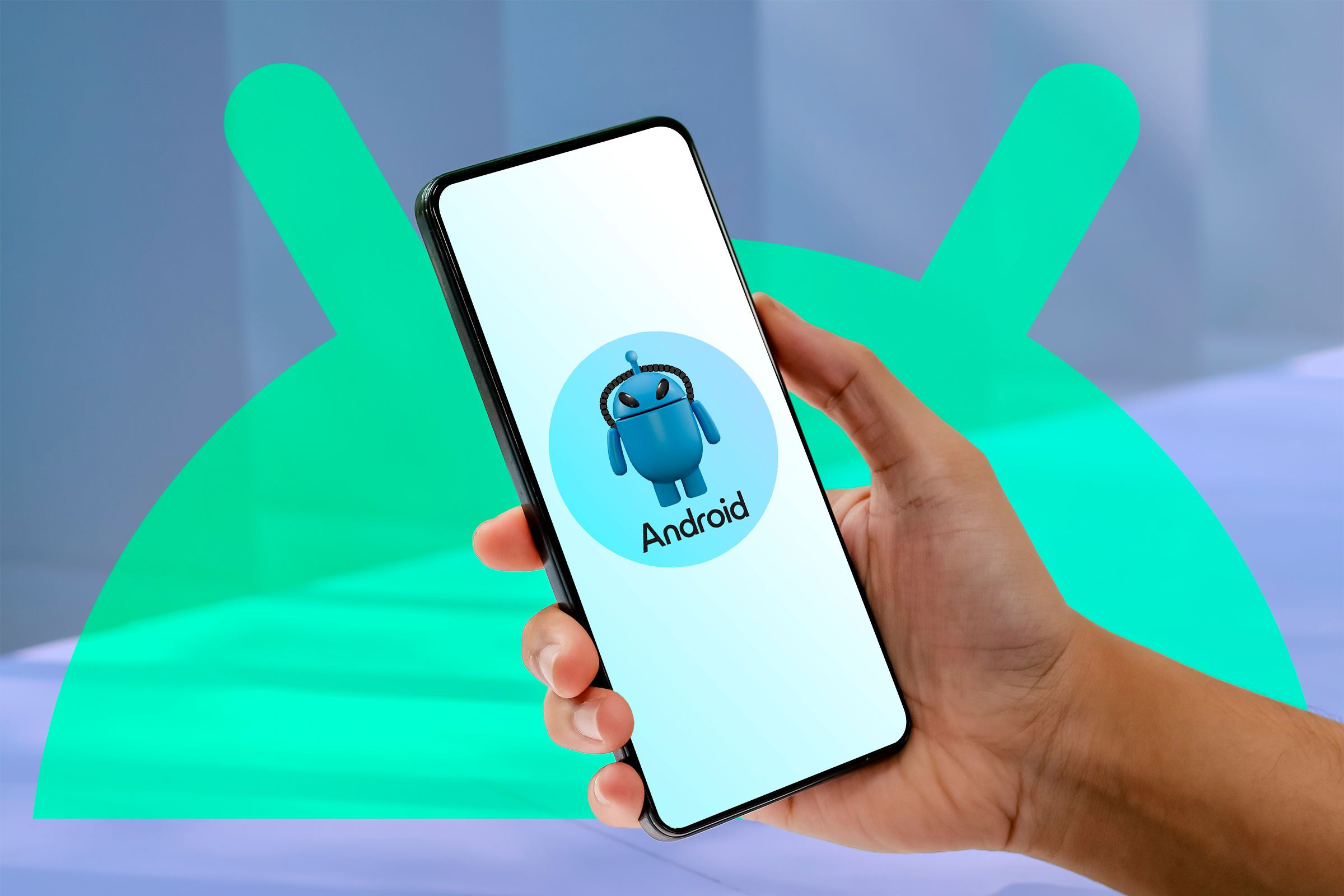 A person holding a phone with a modified Android mascot.