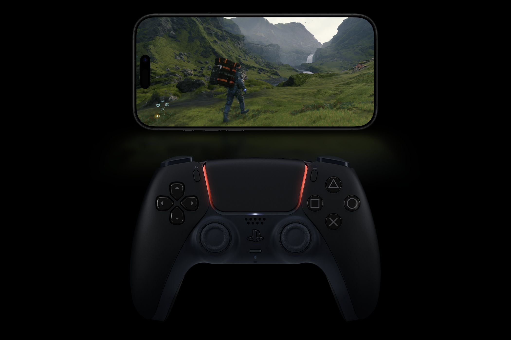 An iPhone running 'Death Stranding' with a controller next to it.