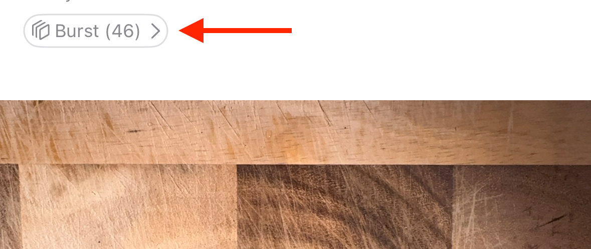 Burst icon in Photos app on iPhone.