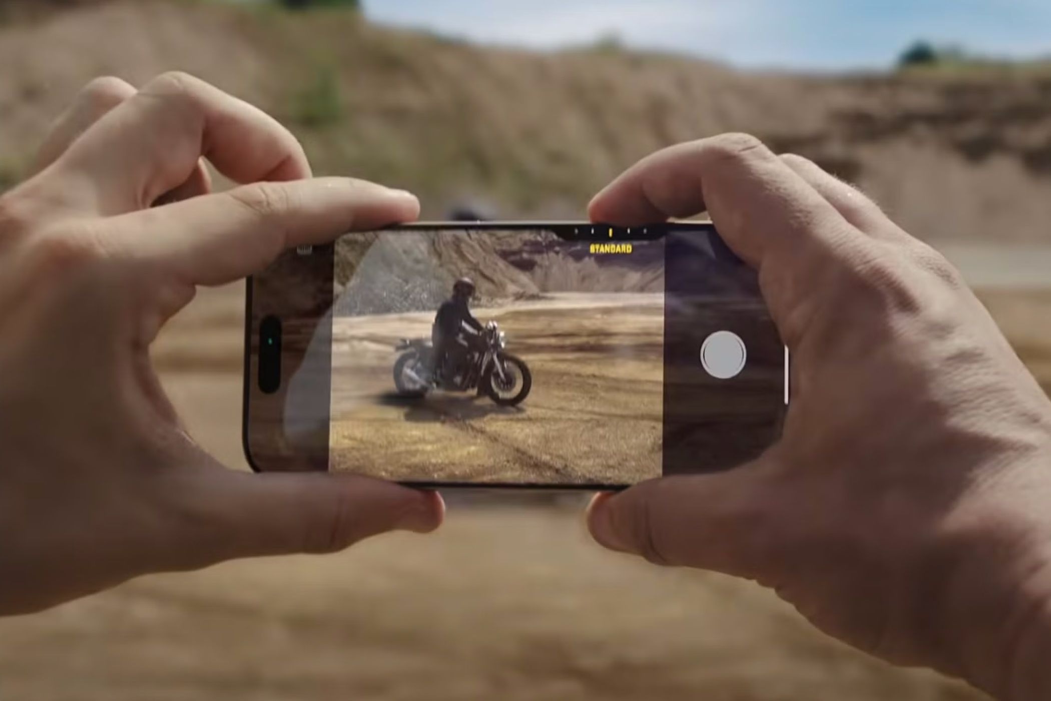 Capturing a fast-moving motorbike on an iPhone 16.