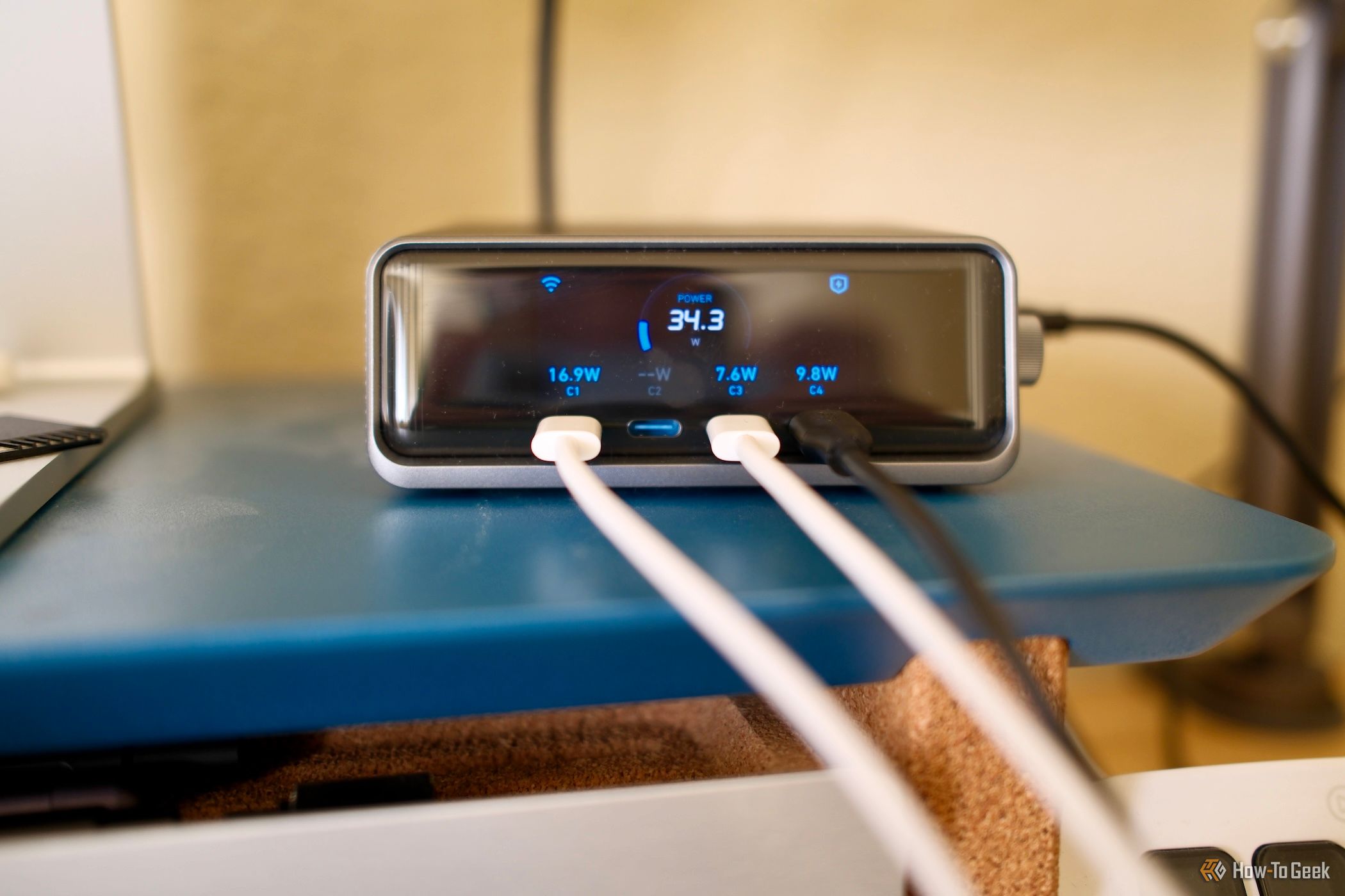 front of the Anker Prime Charger 250W with cables and a smart display