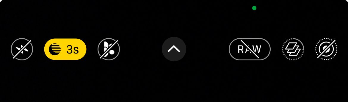 The dark mode icon as it appears in the iPhone Camera app.