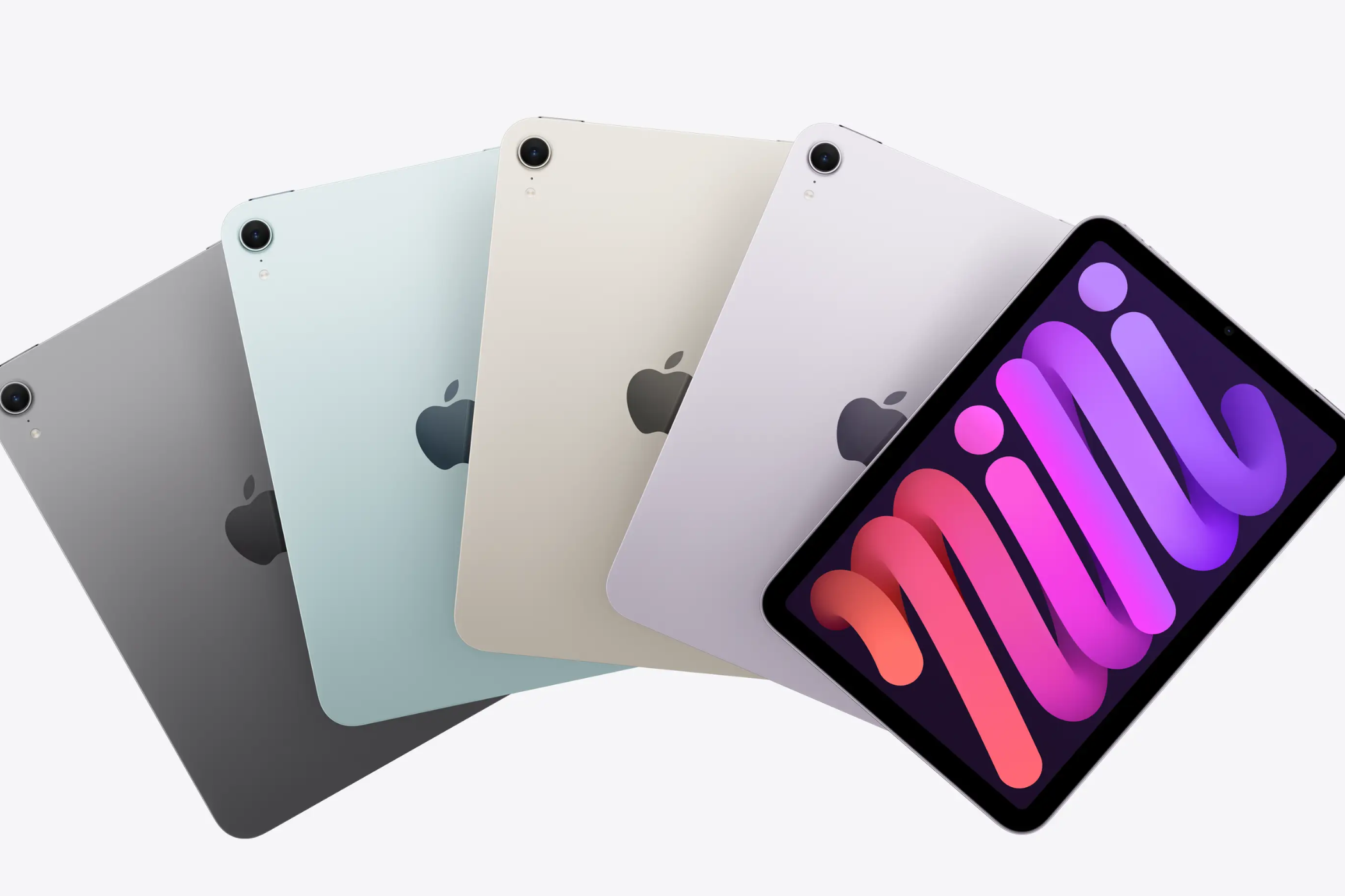 New iPad mini in four colors over a plain gray background.