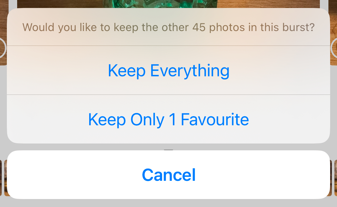 Keep Everything and Keep Only 1 Favorite options in Photos app on iPhone.