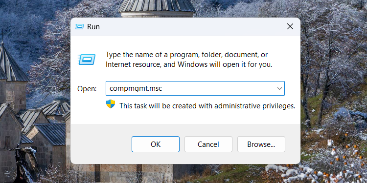 Opening the Computer Management console on Windows 11 using the Run dialog box.