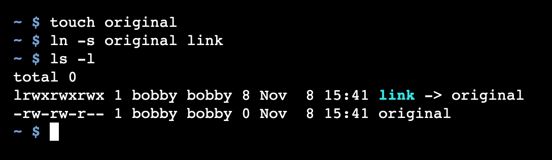 The linux ln command creates a link which ls confirms.