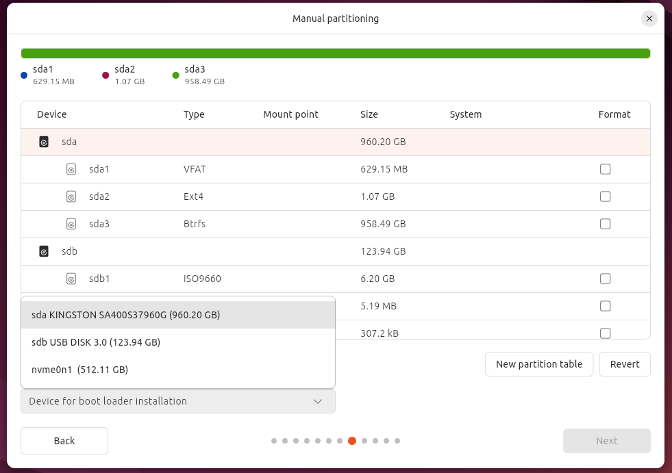 Ubuntu installation manual partition dialog with multiple drives available.