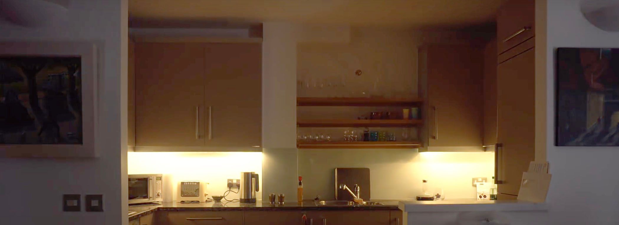 The under-cabinet lighting in the kitchen is controlled by motion sensors.