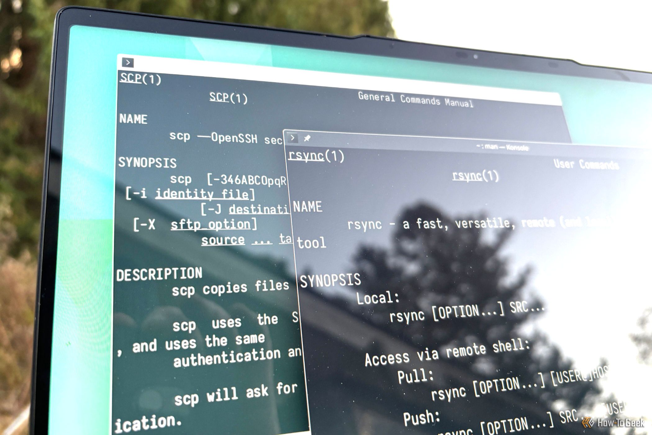 Two terminals on a laptop screen, showing the man pages for the scp and rsync commands.
