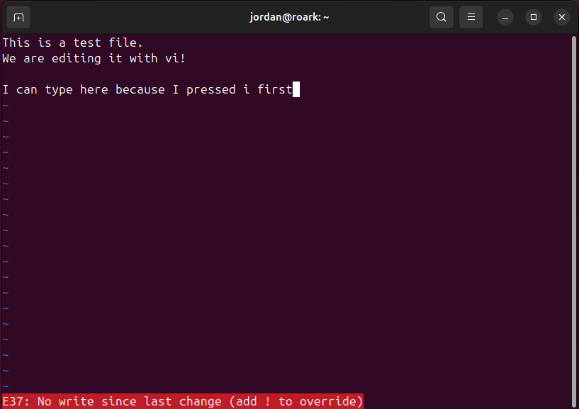 Vi text editor with the error stating "No write since last change" at the bottom of the window.