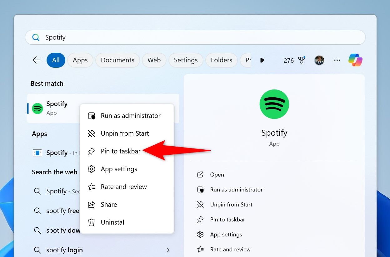 "Pin to Taskbar" highlighted for Spotify.