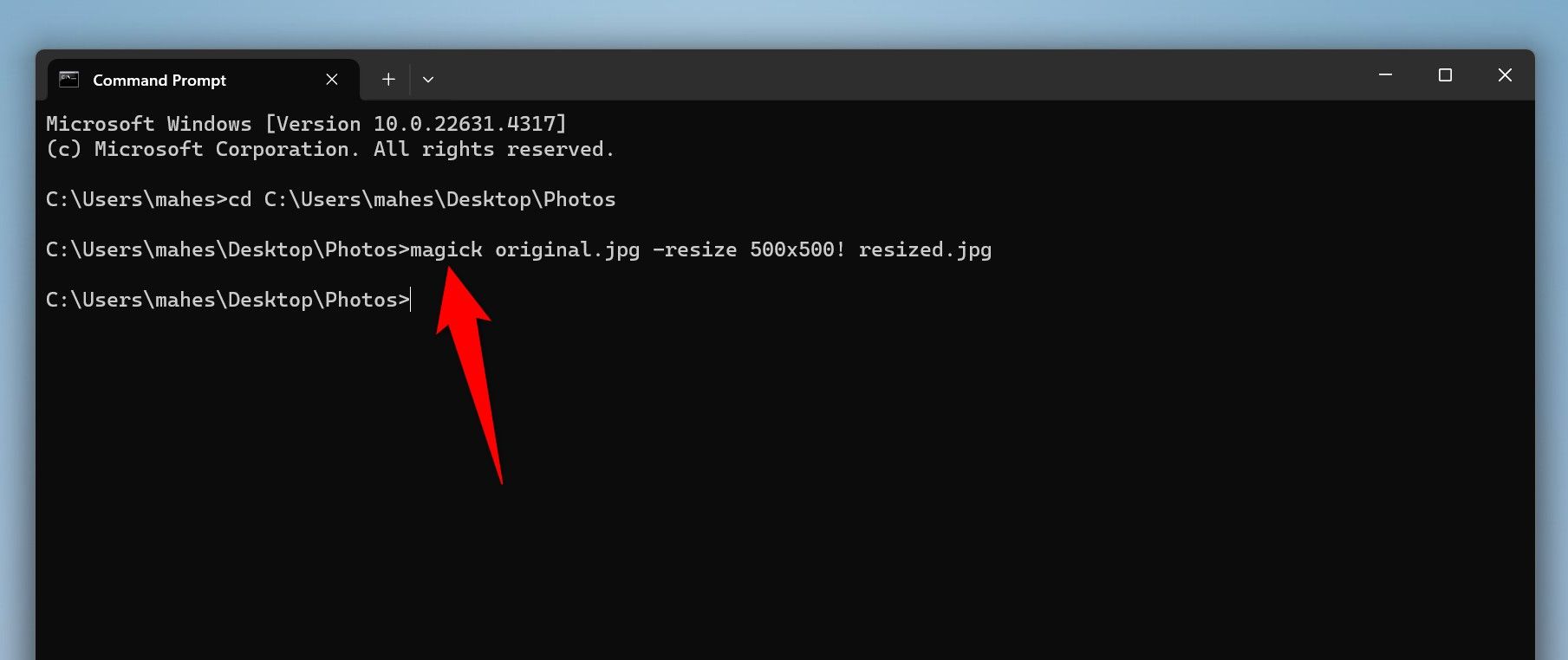 The command to resize an image typed in Command Prompt.