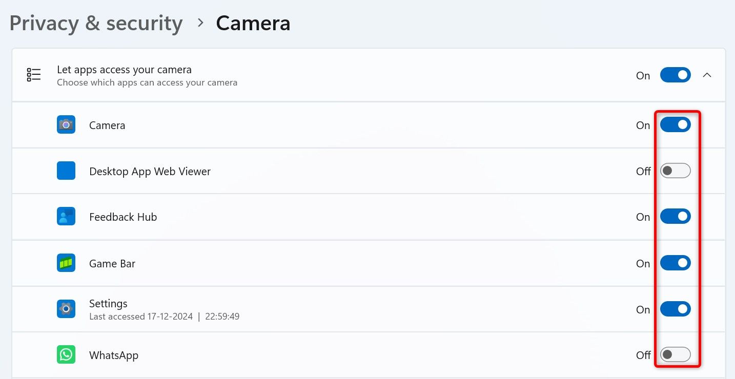 Toggles to manage camera access for various apps highlighted.