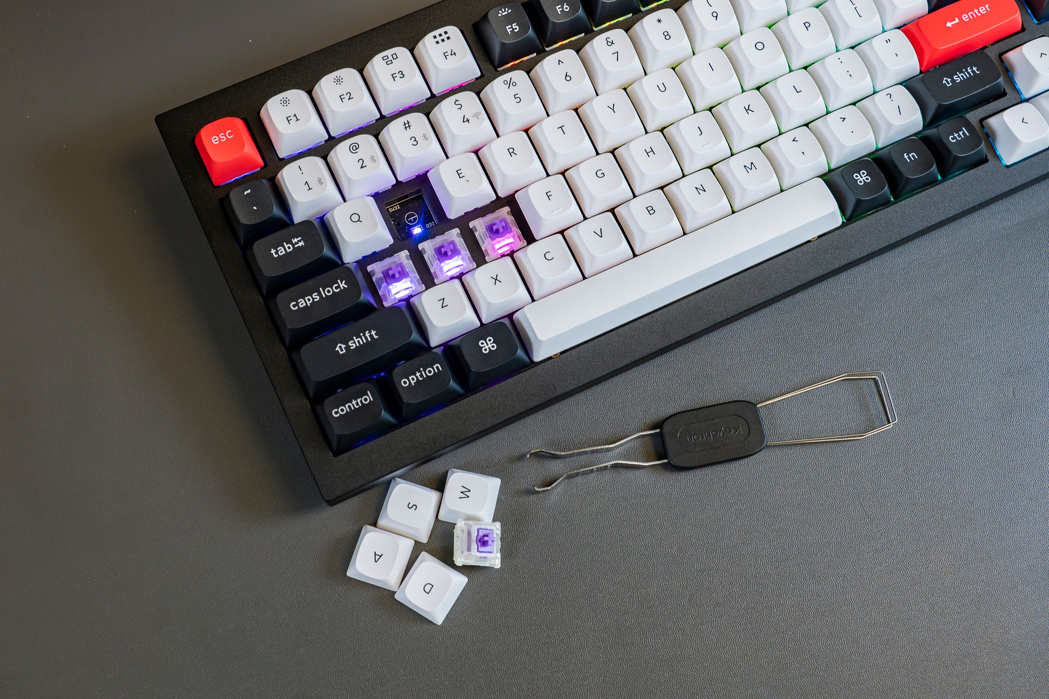 The Keychron Q1 HE -Wireless QMK Custom Magnetic Switch Keyboard with keys removed.