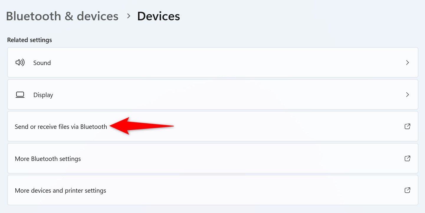 "Send or Receive Files via Bluetooth" highlighted in Windows 11 Settings.