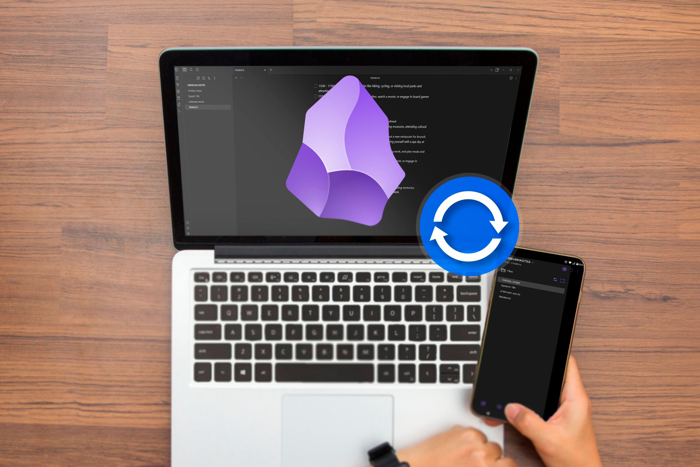 A laptop and a smartphone with Obsidian open, the Obsidian logo in the center of the laptop screen, and a sync icon.