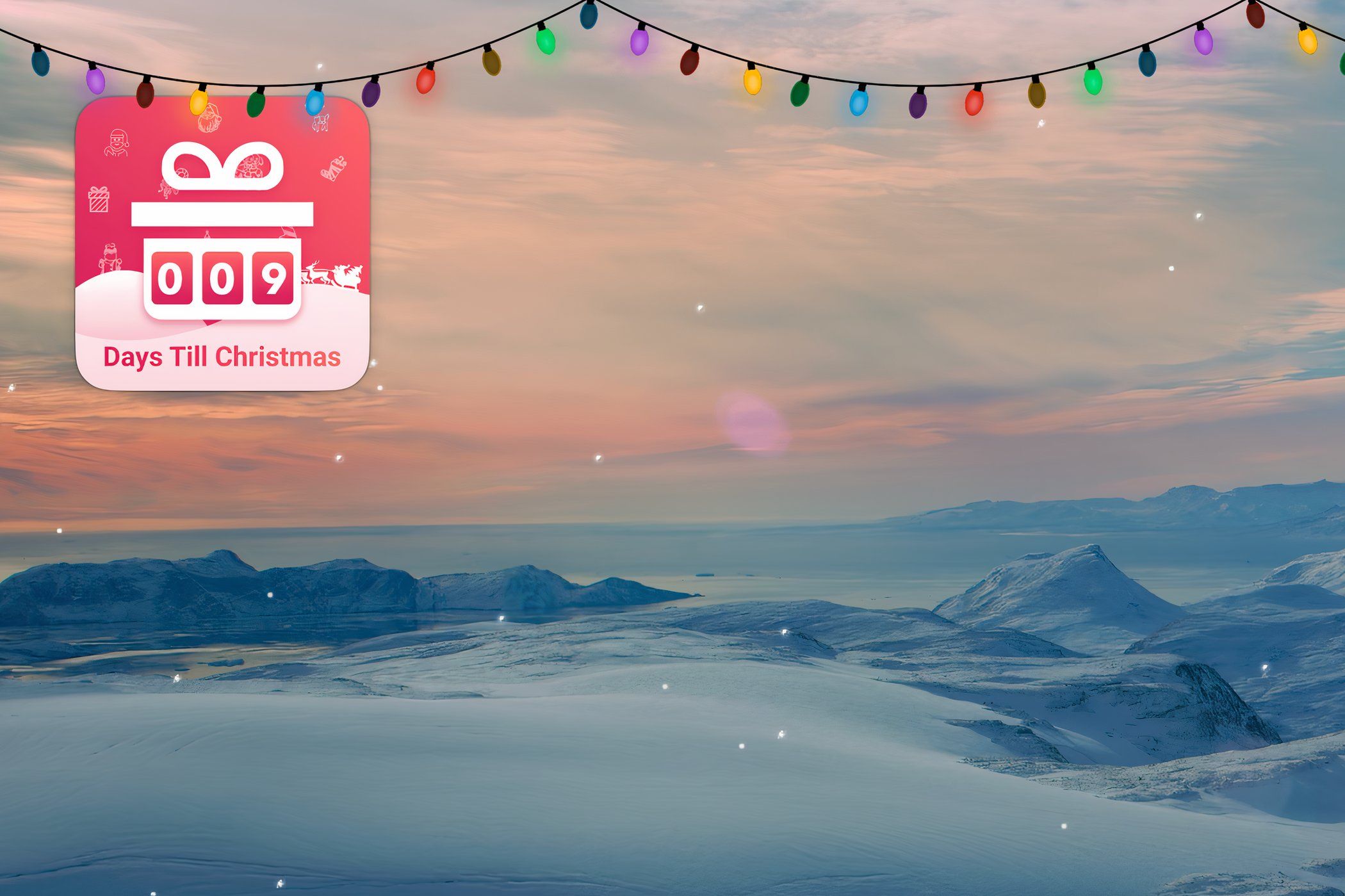 A Mac desktop with Christmas lights, a Christmas countdown widget, and snow.