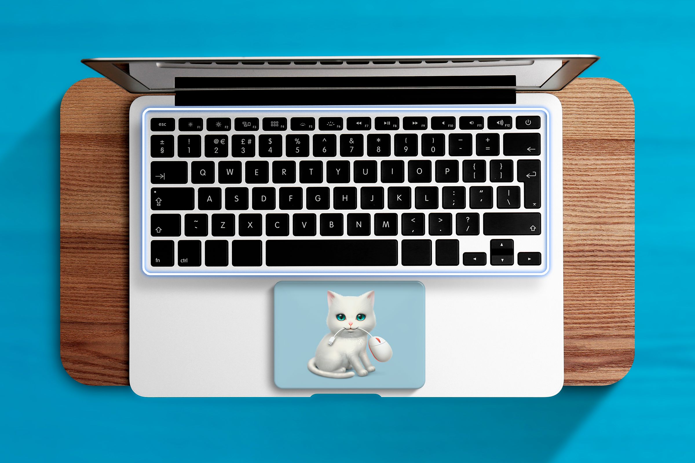 A macbook with the keyboard highlighted and the shortcat logo.