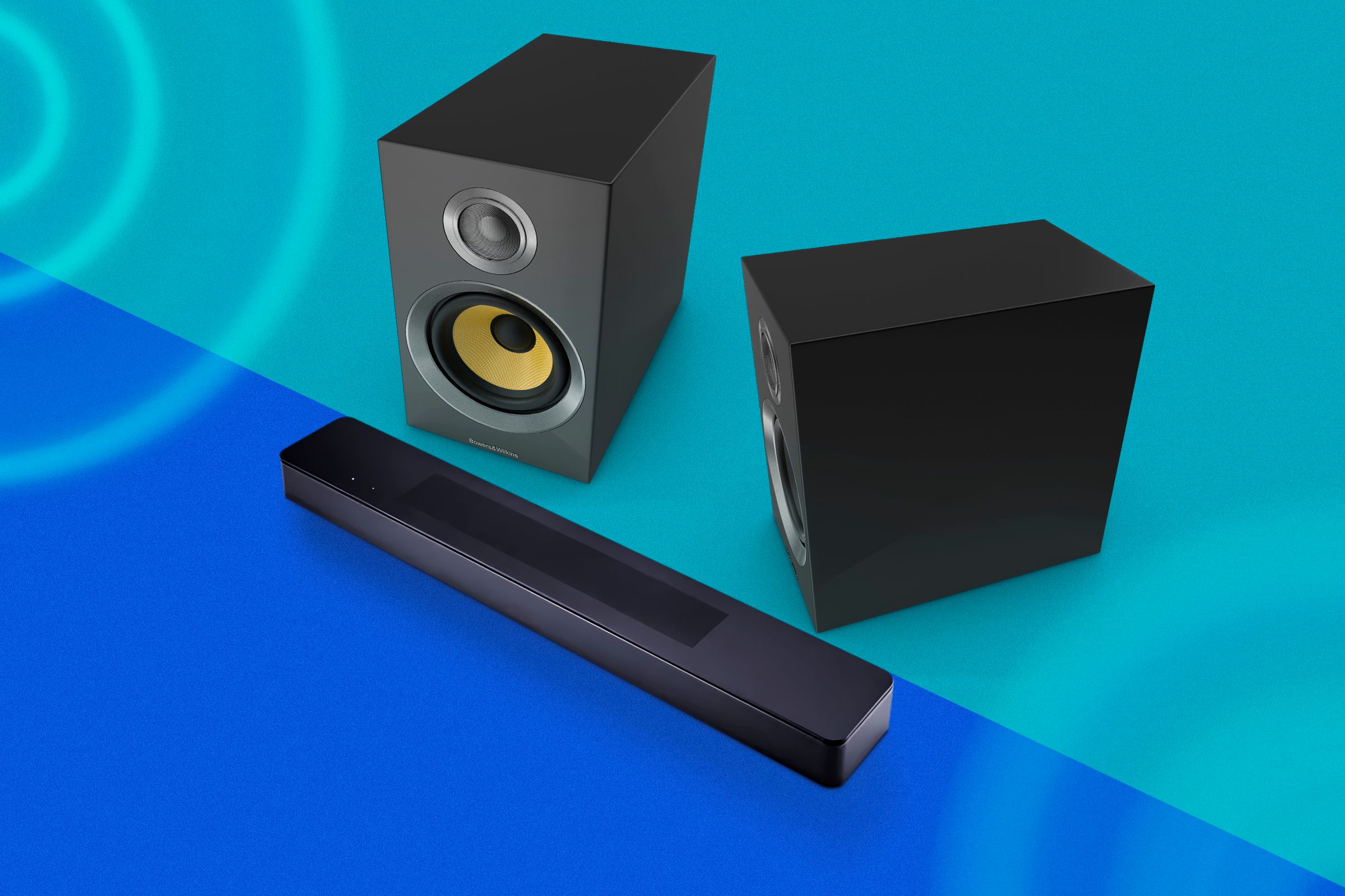 A soundbar and two speakers next to it.