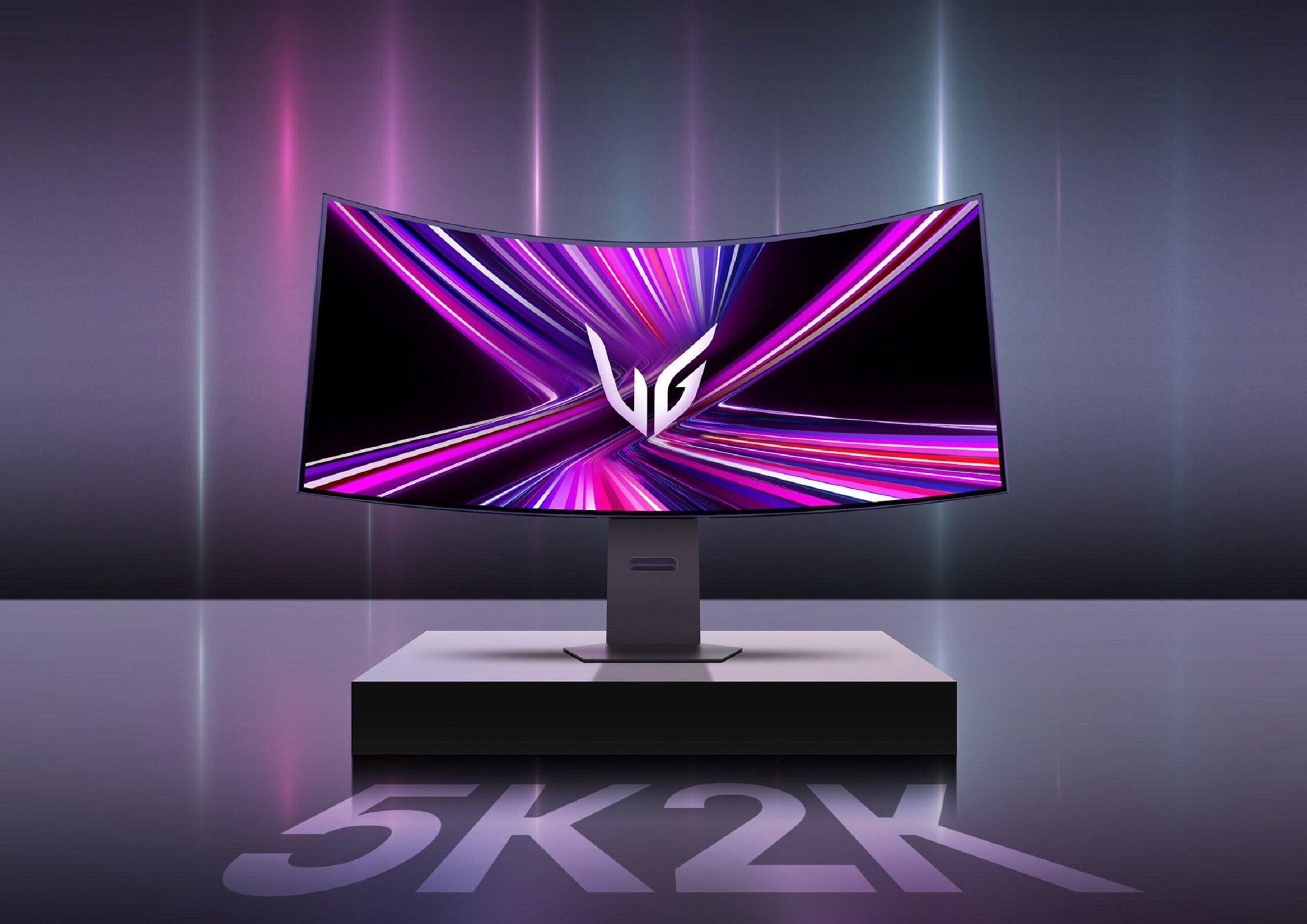 LG UltraGear GX9 gaming monitor on a cabinet, with the phrase "5K2K" printed beneath.