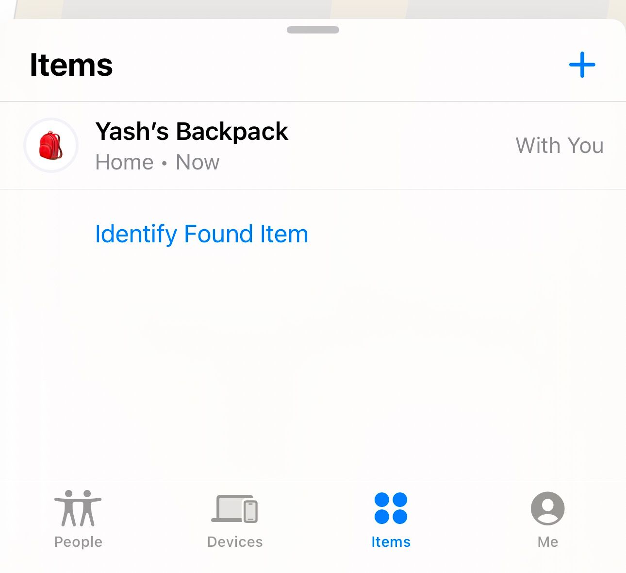 Items tab in the Find My app on an iPhone showing the paired AirTag.