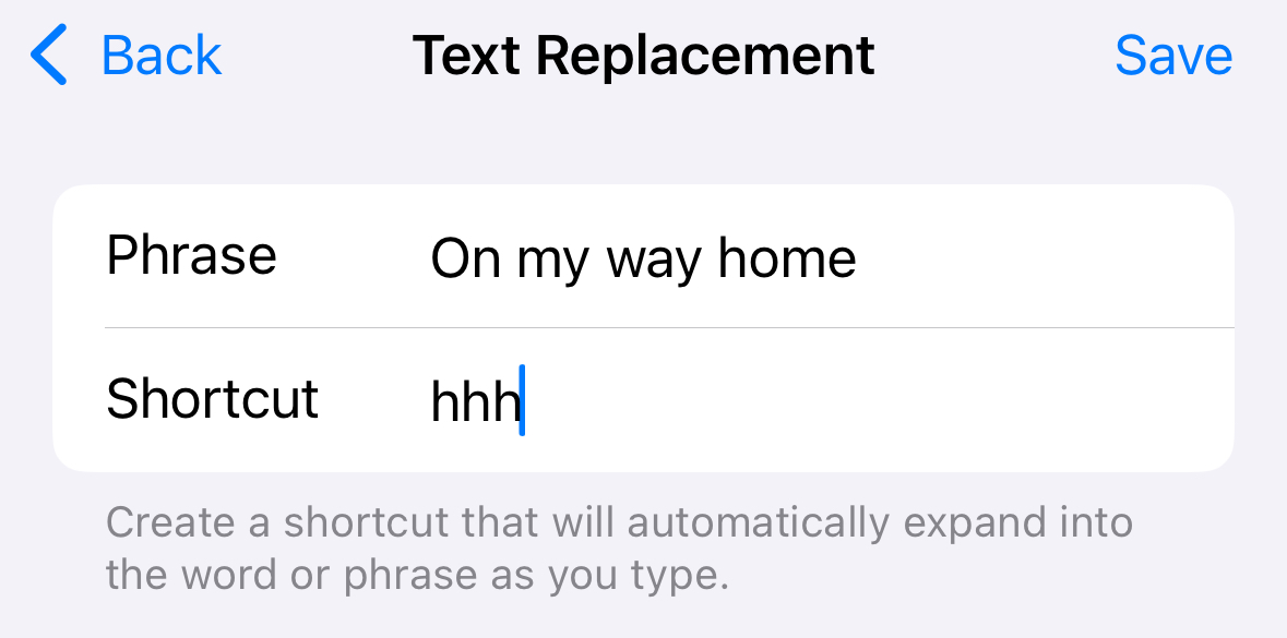 Text replacement phrase and shortcut on iPhone.