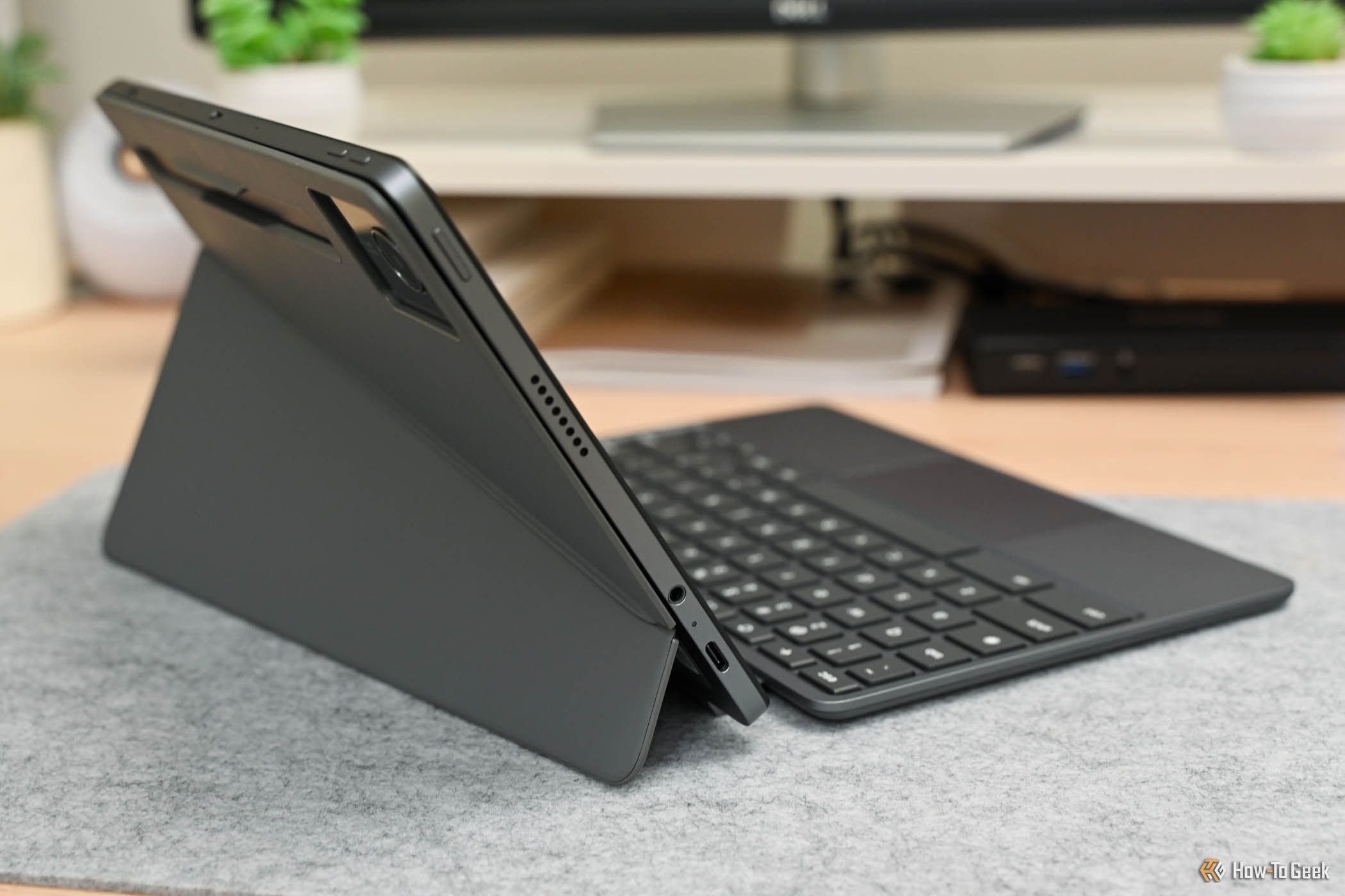 The Lenovo Chromebook Duet 11-Inch using the rear cover as a stand with the keyboard case.