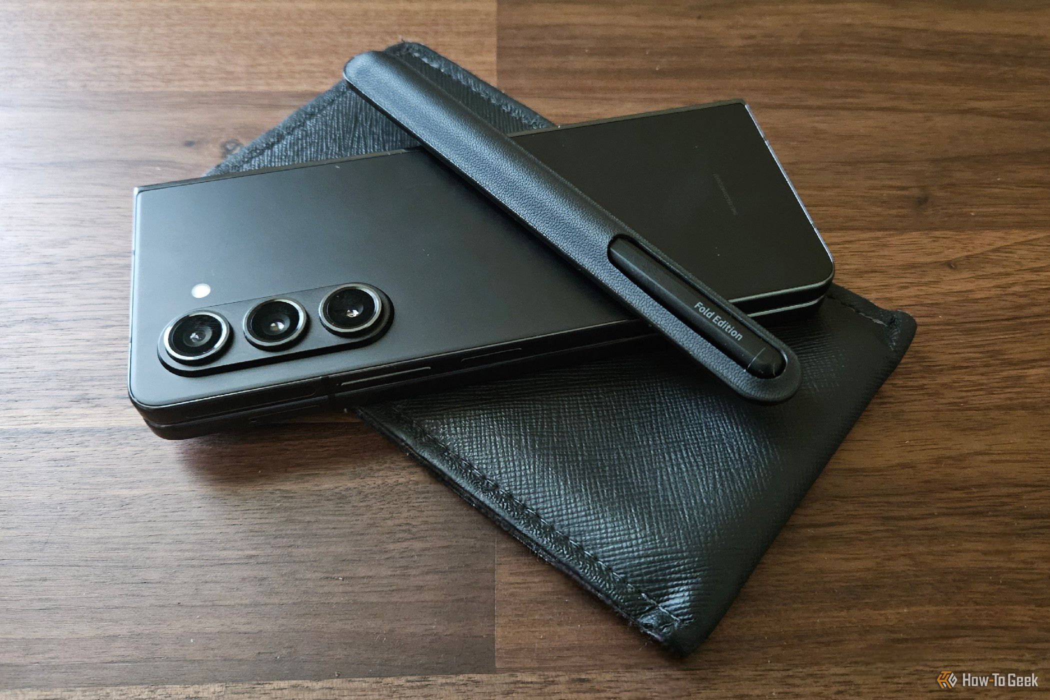 Samsung Galaxy Z Fold 5 with an S Pen and a sleeve.