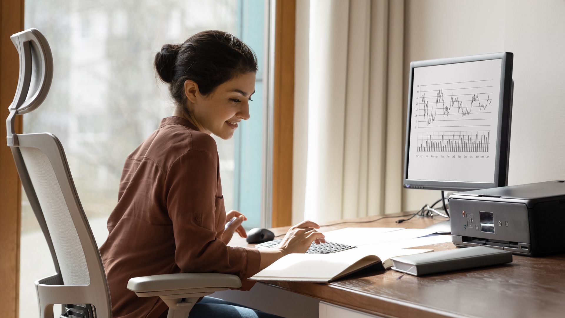 Woman working in a home office.