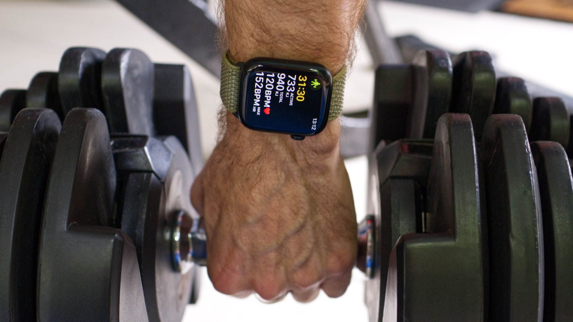 Apple Watch Series 8 being worn during a resistance training exercise