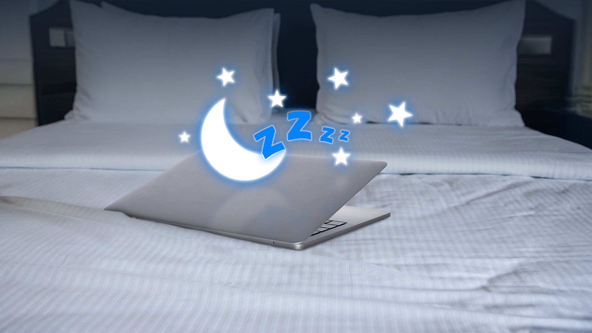 A half-open laptop on a bed with an illustration indicating the laptop is sleeping.