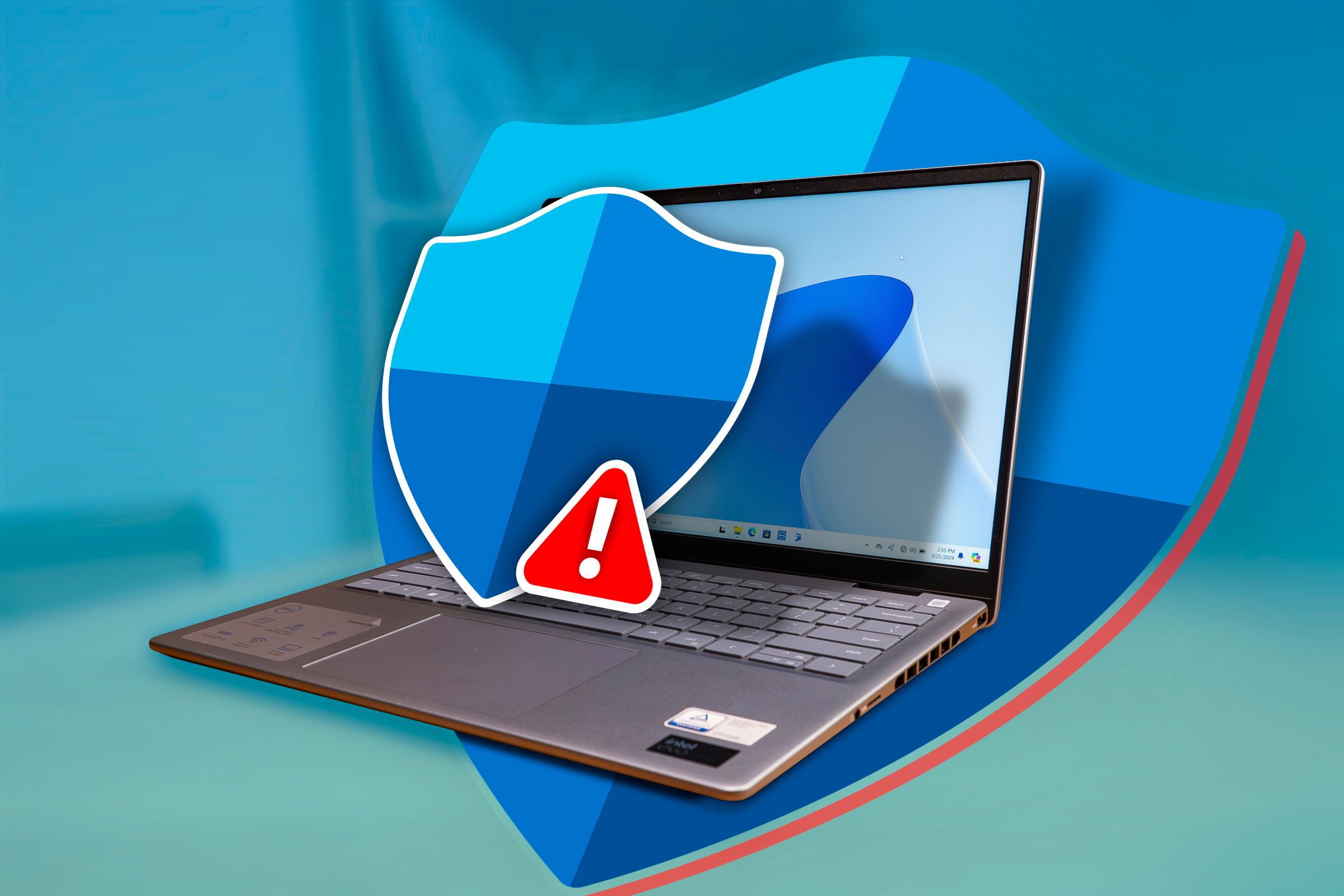 A laptop with the Windows Defender logo coming out of the screen.