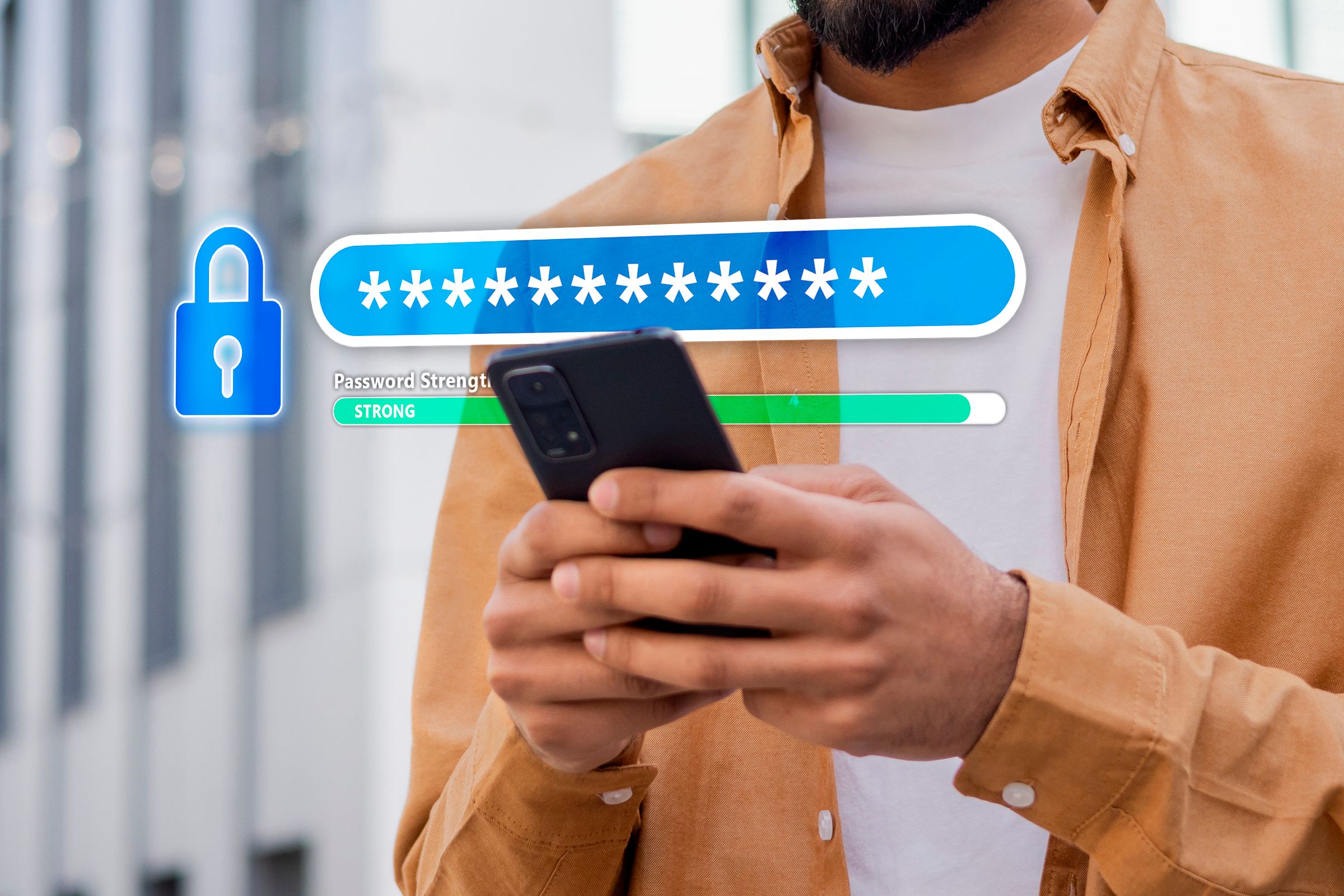 A person holding a phone with a field containing a strong password hovering above the screen.