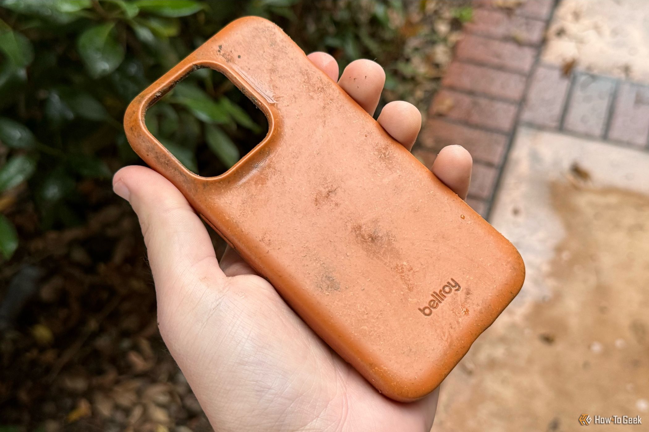 Bellroy Bio Phone Case being held by a human hand.