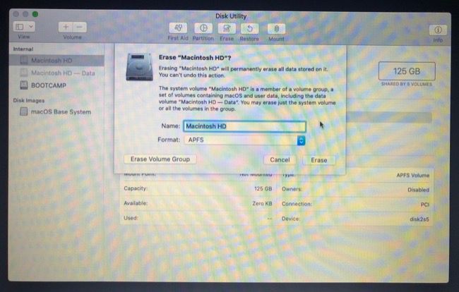 Erasing system partition in macOS recovery or installation mode.