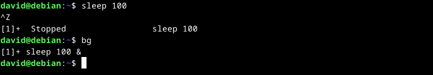 Placing a sleep process in the background using job control in the Linux shell.