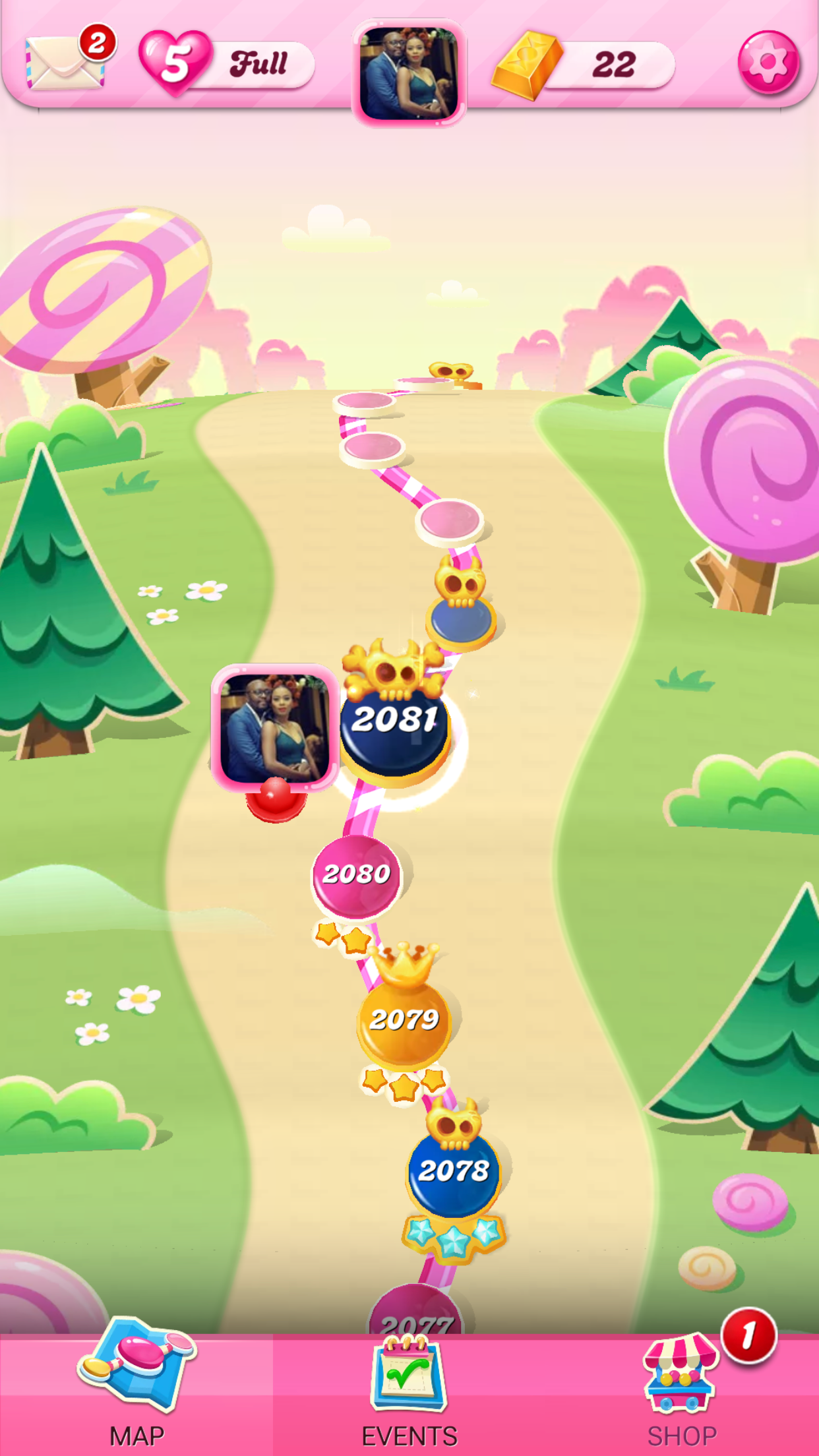 The "Map" screen in "Candy Crush Sage" on iPhone.