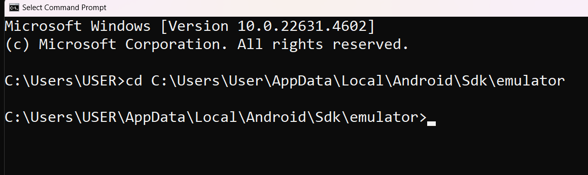 The command prompt window with the command to navigate to the emulator folder.