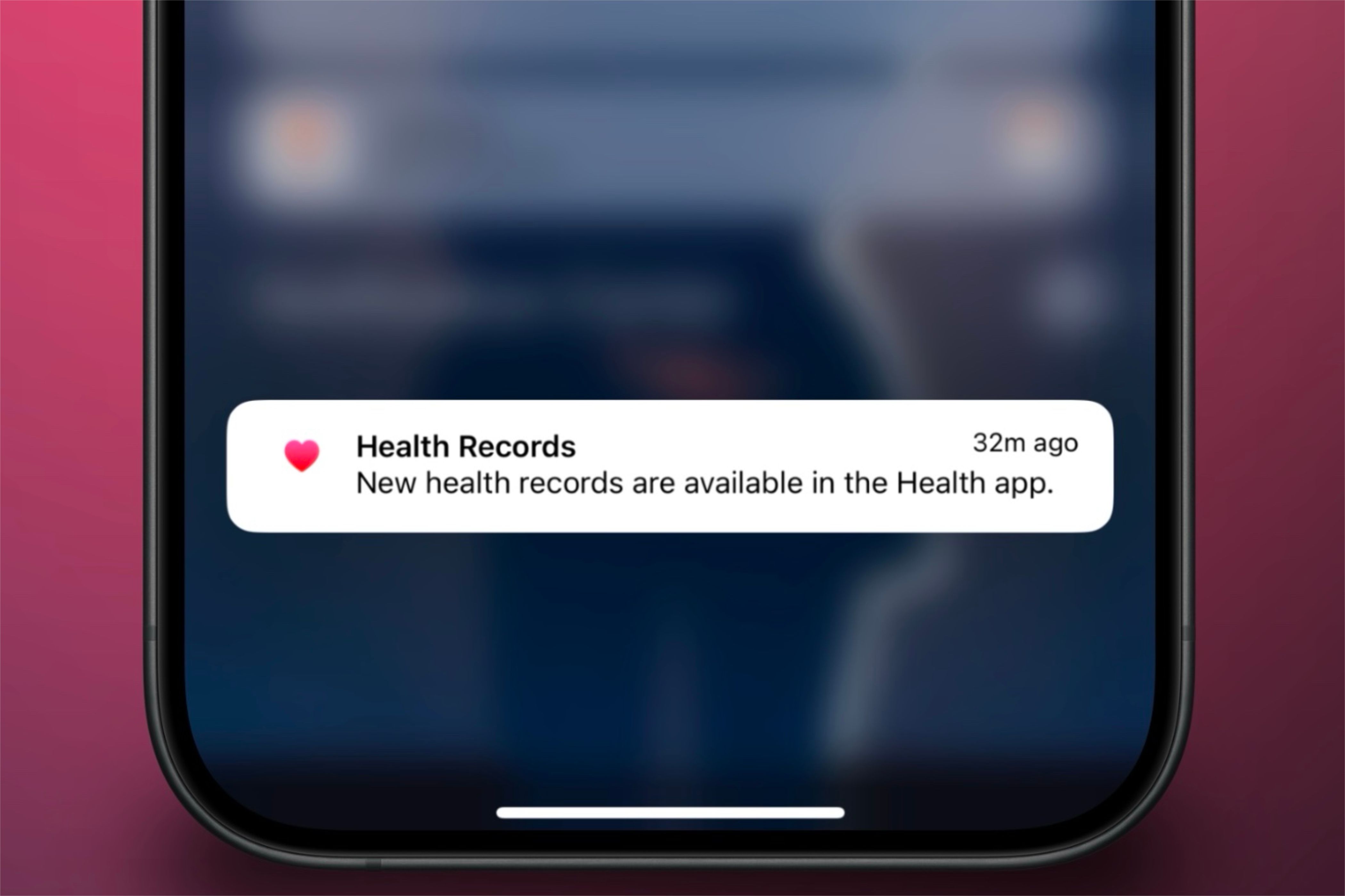 A notification from the Apple Health app mentioning new health records being available to view. It is on an iPhone with a colorful background behind it.