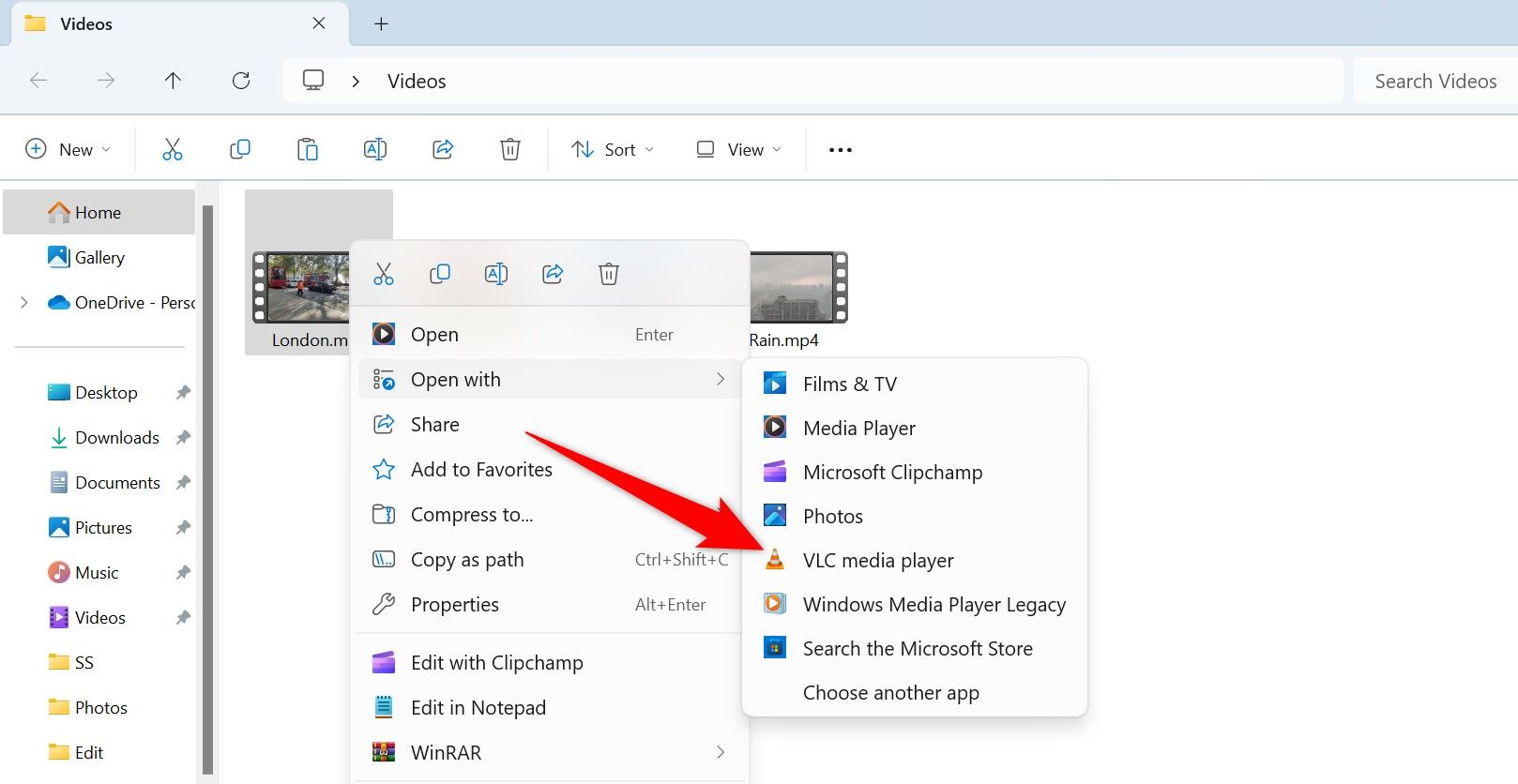 Open With > VLC Media Player highlighted for a video in File Explorer.