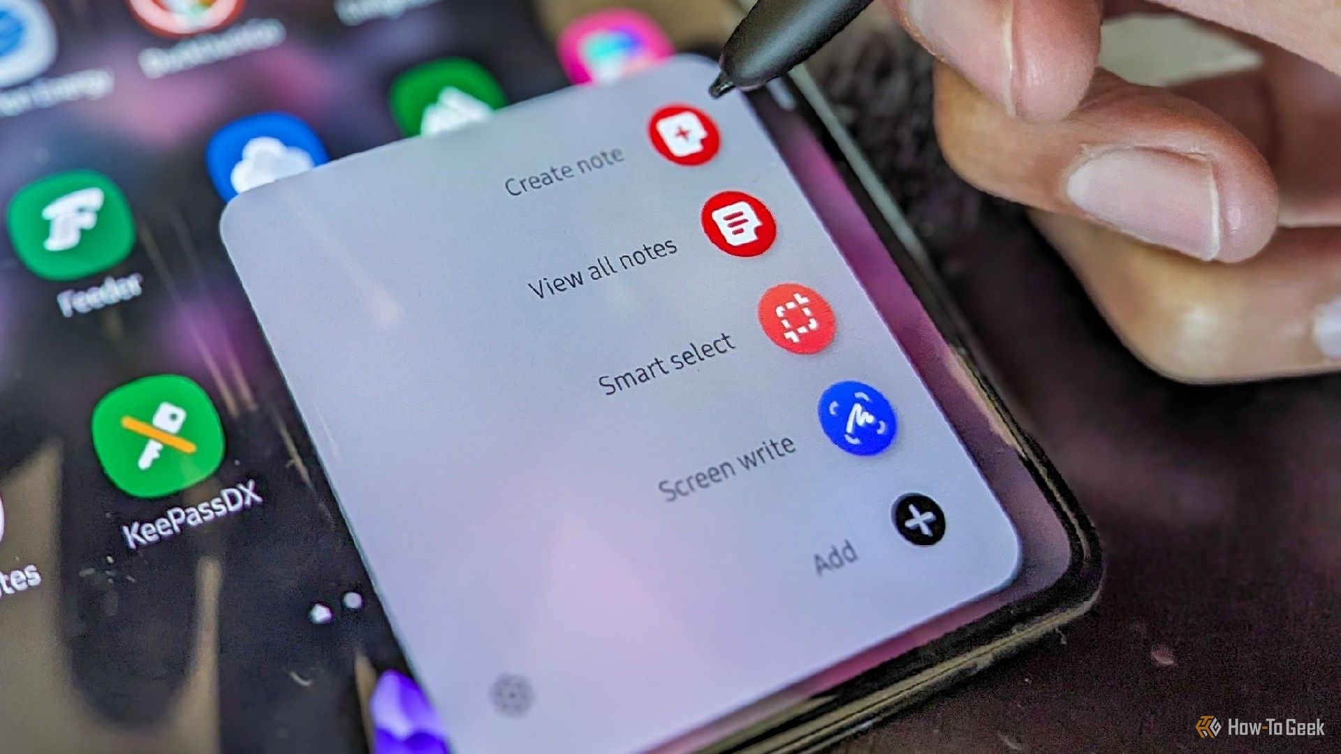 An S Pen activating an Air Command menu on a Galaxy Z Fold 5.