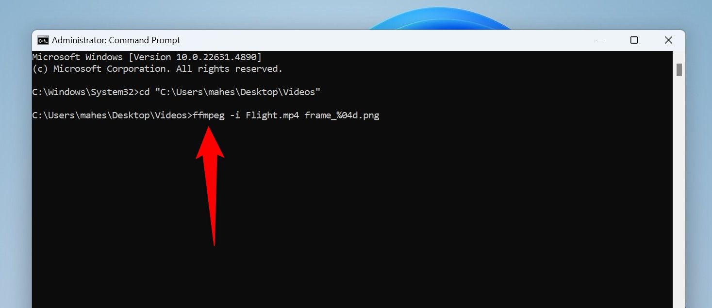 The command to extract all frames as still images from a video typed in Command Prompt.